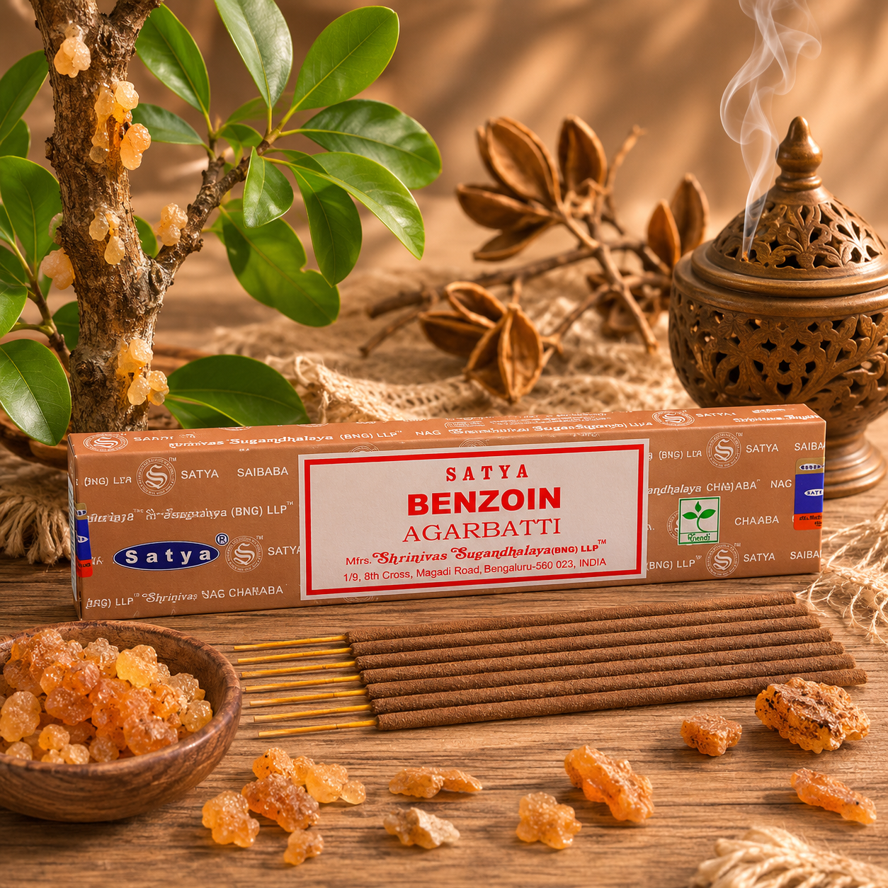Encens Satya Benzoin 15g avec bâtonnets d'encens, résine de benjoin et branche de Styrax dans une ambiance zen et chaleureuse.